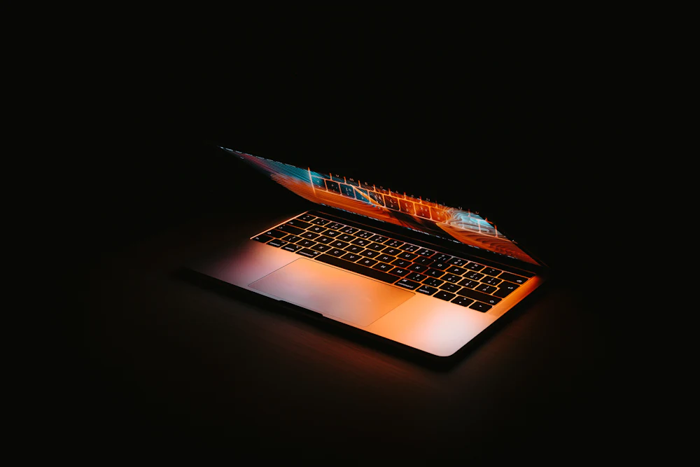 Laptop with warm light for custom web development