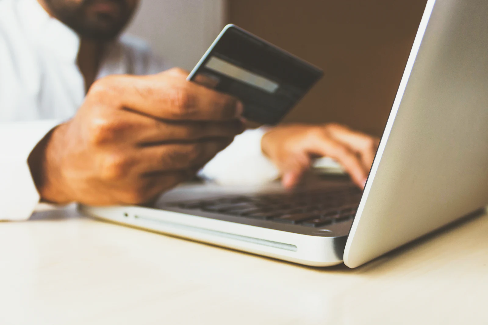 Customer paying in a Shopify online store checkout on a laptop