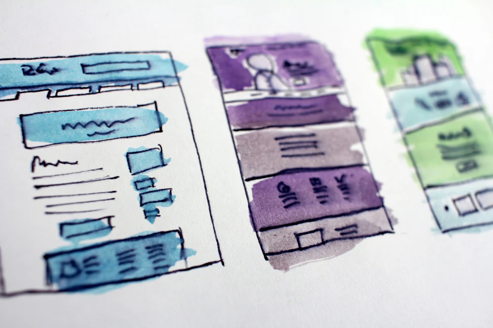 Website wireframe sketches during UX planning for a web design project